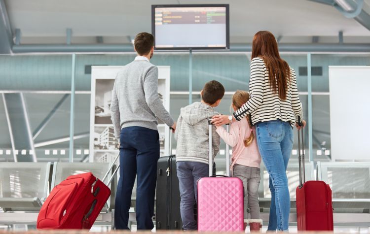 A Family arriving to the airport for a trip