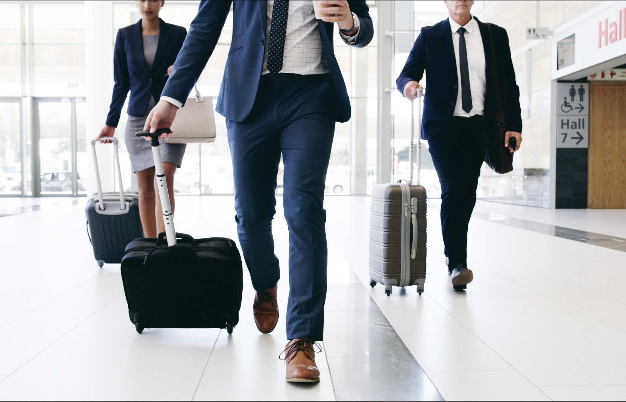Business travelers headed into a meeting