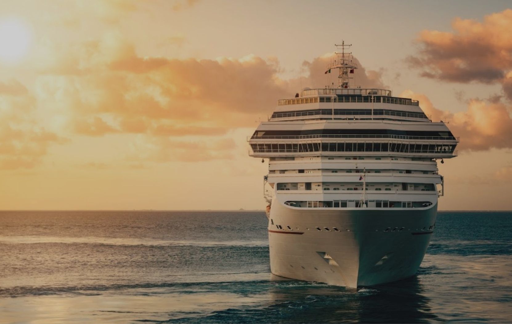 Cruise sailing at sunset