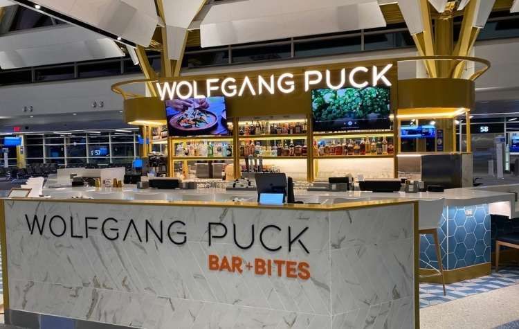 E Gates- Wolfgang Puck Bar + Bites