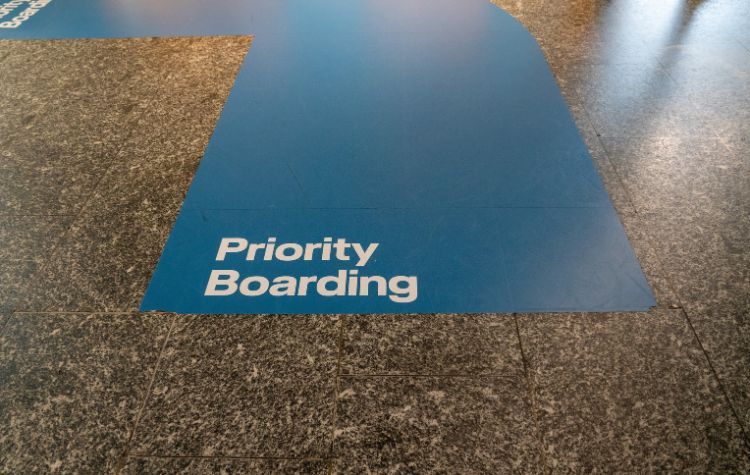 Priority Boarding sign on floor