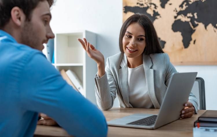 Travel Agent helping a client