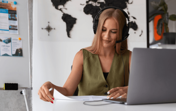 Travel agent at work with headset on